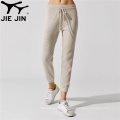 2020 Jiejin Gym Fitness Jogger Pantalones de jogger de color sólido Pantalones de sudor